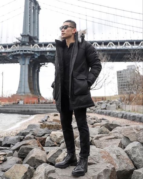 Leo Chan of Levitate Style wearing Nobis puffer jacket with fur lined hood casual winter city style all black look #mensstyle #winteroutfit Black Parka Outfit Men, Parka Outfit Men, Black Parka Outfit, Parka Outfits, All Black Winter Outfit, Puffer Jacket With Fur, Black Parka, Winter City, Jacket With Fur