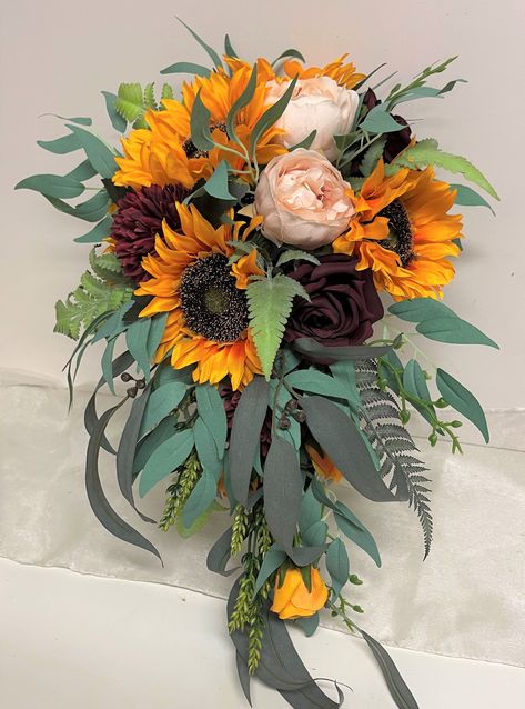 Sunflower cascading teradrop wedding bouquet Dark Sunflower Wedding Bouquet, Sunflower Peony Bouquet, Wedding Bouquet Fake Flowers, Hand Tied Bridal Bouquet, Bouquet Sunflower, Dried Sunflowers, Sunflower Bridal Bouquet, Bouquets Ideas, Teardrop Bouquet