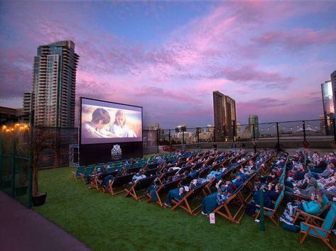 Outdoor Movie Projector Screen, Rooftop Movie, Rooftop Cinema Club, Beautiful City At Night, Outdoor Theater Ideas, Outdoor Amphitheatre, Cinema Outdoor, Car Elevator, Movie Projector Screen