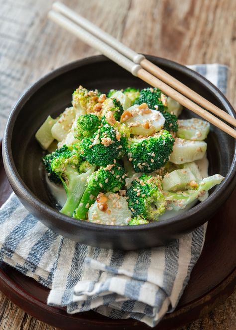 Asian-style sesame broccoli salad is a healthy, crisp Korean side dish. This easy salad is tossed in a creamy, nutty dressing made with toasted sesame seeds, mayonnaise and peanut butter. Ideal for spring or summer BBQs. Asian Broccoli Salad, Korean Corn Cheese Recipe, Toasted Sesame Dressing, Blanching Broccoli, Sesame Broccoli, Asian Broccoli, Korean Corn, Broccoli Side Dish, Food Project