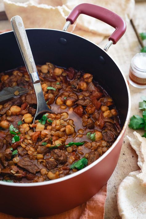 This lamb lentil stew is flavored with Moroccan spices and beefed up with chickpeas. Serve with fresh cilantro and a dollop of yogurt for a hearty and comforting winter meal. | #JustAddPulses #HalfCupHabit #sponsored Ramadan Meals, Moroccan Stew, Veal Stew, Dal Recipes, Lentil Vegetable Soup, Lamb Stew Recipes, Winter Stews, Inexpensive Dinners, Delicious Family Dinners