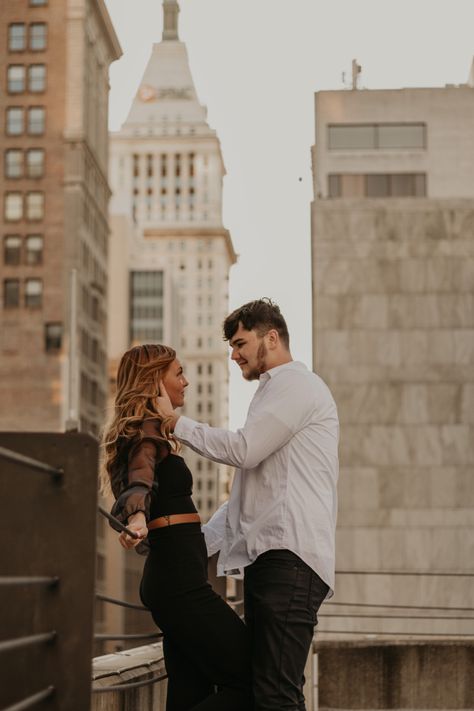 Couples Photoshoot Location Ideas, Couple Picture Ideas Downtown, Rooftop Parking Garage Engagement Photos, Couple Poses Parking Garage, City Couple Poses, Couples Photoshoot Parking Garage, Parking Deck Photoshoot Couples, Sunset Rooftop Photoshoot, Couple Rooftop Photoshoot