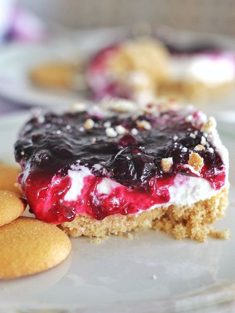 Grandma's Blueberry Delight - no-bake, layered dessert made of Nilla wafers, whipped cream and blueberry compote. #cakebycourtney #blueberrydelight #nobakedessert #layereddessert Nilla Wafer Crust, Whipped Cream Filling, Cake By Courtney, Blueberry Delight, Layered Dessert, Blueberry Coffee Cake, Blueberry Coffee, Caramel Apple Cheesecake, Blueberry Compote