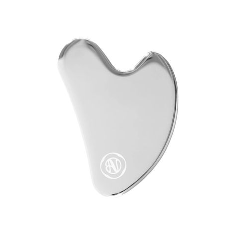 Agent Nateur Stainless Steel Gua Sha Facial Sculpting And Lifting Tool helps assist lymphatic drainage, puffiness and circulation while contouring the face and relieving muscle tension. Made of 100% stainless steel which makes it easy to clean and disinfect. Safe and effective for all skin types. KEY BENEFITS: Stainless Steel - Known for its ability to quickly adjust to the skin's temperature, making it cool to the touch. This cooling effect can help soothe the skin, reduce redness, and decrease facial puffiness, particularly when used in conjunction with Agent Nateur Holi (Lift) and Holi (Oil) . Muscle Relaxation and Recovery - Gua Sha can help relax muscles, release tension, and alleviate discomfort caused by conditions like tech neck and chronic muscle stiffness. The scraping motion of Facial Sculpting, Steel Gua Sha, Agent Nateur, Facial Puffiness, Relax Muscles, Tech Neck, Muscle Knots, Facial Massage Tool, Gua Sha Facial