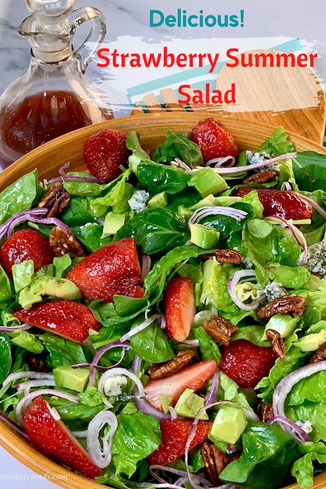 Big wooden salad bowl with a tossed green salad including green lettuce, sliced strawberries, red onion, avocado, sweet walnuts and blue cheese with a jar of salad dressing in the background. Summer Green Salad Recipes, Salad Recipes With Strawberries, Summer Green Salad, Dressing For Fruit, Recipes With Strawberries, Strawberry Dressing, Dressing For Fruit Salad, Summer Salads With Fruit, Green Salad Recipes