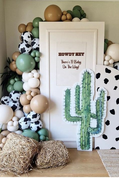 Yee-hah! This has got to be one of our favorite ways to round up these baby shower ideas for twins. This color scheme is super fun with the addition of the cow print and it brings a gorgeous and fun element to a baby shower.  Go one step further and get your guests to dress the part too! Cows Baby Shower Theme, Little Boy Baby Shower Themes, A Little Cowgirl Is On Her Way Baby Shower Ideas, Country Baby Shower Ideas Girl, Cute Baby Shower Ideas Themes, Baby Boy Themed Baby Shower Ideas, First Rodeo Baby Shower Ideas, Our First Rodeo Baby Shower Ideas, Country Themed Baby Shower Ideas