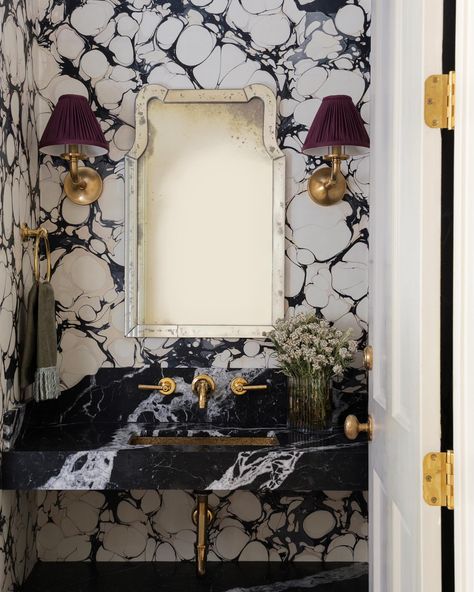 Our latest work: a formal powder bath that stops you in your tracks! Hand-marbled wallpaper by @ruleofthreestudio captivates alongside a… | Instagram Floating Marble Vanity Powder Room, Statement Half Bath, Dramatic Half Bath, Powder Bath Wallpaper Ideas, Maximalist Powder Room, Moody Powder Bath, Bold Wallpaper Bathroom, Powder Bath Wallpaper, Statement Bathroom