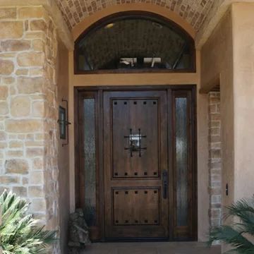 75 Beautiful Mediterranean Front Door Pictures & Ideas - January, 2022 | Houzz Tuscan Doors Front Entry, Hacienda Style Doors, Italian Front Doors Entrance, Spanish Style Home Front Door, Spanish Style Front Door Entryway, Hacienda Front Door, Spanish Doors Entrance, Mediterranean Doors Front Entry, Spanish Front Door