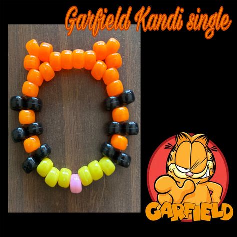 handmade Garfield bracelet size can be adjusted to buyer's personal liking please dm me if so. Creative Bracelets Diy, Garfield Gift Ideas, Kandi Garfield, Gir Kandi Cuff Pattern, Garfield Jewelry, Garfield Bracelet, Kandi Inspo Single, Halloween Kandi Bracelets, Garfield Kandi