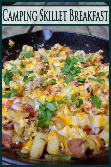 a cast iron skillet of potatoes, peppers, bacon, eggs, and cheese, topped with parsley. Overlaid text says camping skillet breakfast. Iron Skillet Breakfast Recipes, Iron Skillet Breakfast, Breakfast Potatoes Skillet, Skillet Breakfast, Campfire Breakfast, Breakfast Skillet Recipes, Camping Breakfast, Breakfast Skillet, Iron Skillet Recipes