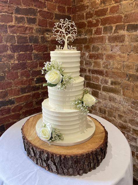 Beautifully simple 3 tier buttercream frosted wedding cake decorated with artificial roses & gypsophilia and a tree of life topper Simple 3 Tier Wedding Cake, Frosted Wedding Cake, Cake Texture, Spiderman Cake Topper, 3 Tier Wedding Cakes, Spiderman Cake, Tiered Wedding Cake, Artificial Roses, Sugar Flowers