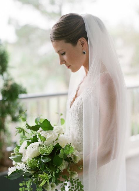 47 Wedding Hairstyles That Look Perfect With a Veil Wedding Hairstyles Bun With Veil, Bridal Mid Bun, Mid Bun Wedding Hair, Mid Bun Hairstyles, Wedding Low Bun Hairstyles, Wedding Low Bun, Updo Veil, Bride Bun, Bridal Updo With Veil