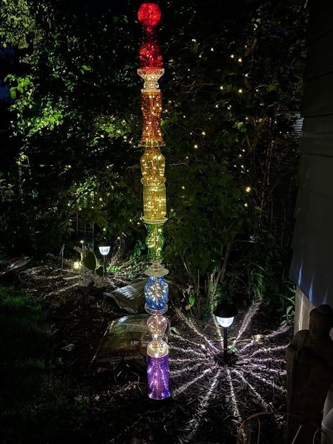 Recycle, Reuse and Repurpose! | I have been obsessed with making glass garden totems out of thrifted glass and old lamps | Facebook Glass Garden Totems, Garden Totem, Garden Totems, Totem Poles, Bird Bath Garden, Solar Fairy Lights, Making Glass, Glass Garden Art, Old Lamps