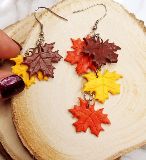 🚀!Important - Christmas orders: If you want to make sure that your package will get to you before Christmas, please choose - DHL Express shipping - upgrade (2-4 day shipping time) at the checkout! Standard postal shipping from Hungary can take 15 business days with delays during the Holiday season! This Maple Leaf Earrings will definitely make your days happier! :) If you love to wear autumn leaf earrings or you are looking for the right Statement Earrings to an Autumn lover then you have came to the right place! Mismatched Earrings/Maple Earrings/ Autumn Leaf Earrings/ Autumn Jewelry/ Fun Earrings/Fall Gift Idea D E T A I L S: * Handmade Maple Leaf Drop Earrings * Made from Polymer Clay * Length: 3 inches (7,6 cm) * Earring posts: Stainless steel * Earrings are light and easy to wear * E Autumn Leaf Earrings, Maple Leaf Clay Earrings, Fall Leaf Earrings, Maple Leaf Earrings, Diy Fall Earrings, Fall Polymer Clay Earring Ideas, Polymer Clay Fall Earrings, Fall Polymer Clay Ideas, Polymer Clay Jewelry Ideas