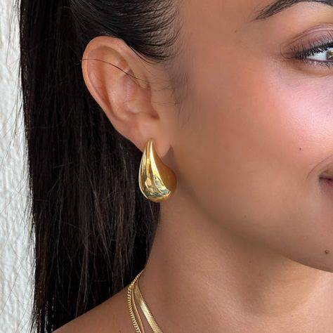 Shop our range of Beautiful Women's Earrings. PRYA has a wide selection of on-trend Gold, Silver and Stainless-Steel Earrings that help you look & feel amazing. Homely Hallway, Jewellery Shoot, Big Dangle Earrings, Pinterest Predicts, Timeless Earrings, Stud Drop Earrings, Tear Drop Earrings, Chunky Earrings, Gold Statement Earrings