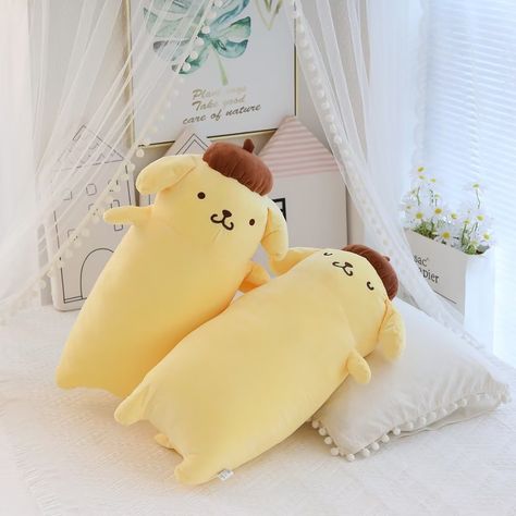 Pom Long Plush Doll This adorable Pom Long Plush Doll is the perfect companion for any child. With its soft and huggable material, it offers comfort and reassurance, making it a great gift for any occasion. Its cute design and long plush fur will bring joy and happiness to anyone who snuggles with it. Pompompurin Plush, Pompom Purin, Sanrio Pompompurin, Pom Purin, Luxury Pillows Decorative, Pom Pom Purin, Bedroom Stuff, Cute Squishies, Dog Doll