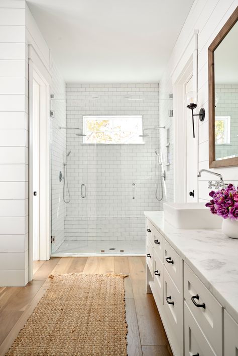 The Most Popular Flooring Trends of 2023 Wood Floors Master Bath, Bathroom White Cabinets Wood Floor, Wood Floors In Bathroom Master Bath, Light Wood Flooring Bathroom, White Vanity Wood Floor Bathroom, Small Bathroom With Tile Floor, Shower Remodel Wood Floor, First Floor Bathroom Ideas, Lvp Floors In Bathroom