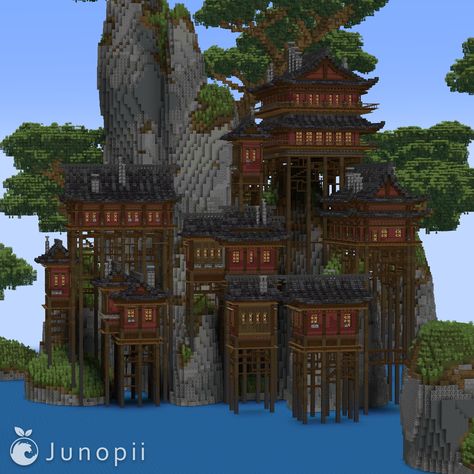 Minecraft build of a Japanese village on stilts by the water with steep rocky cliffs with bonsai trees around it Aesthetic Minecraft Base Ideas, Minecraft Japanese Castle Tutorial, Japanese Mountain Village, Japanese Palace Minecraft, Minecraft Mountain Village, Japanese Bridge Minecraft, Minecraft Japanese Village, Japanese Mountain House, Japanese Sand Garden