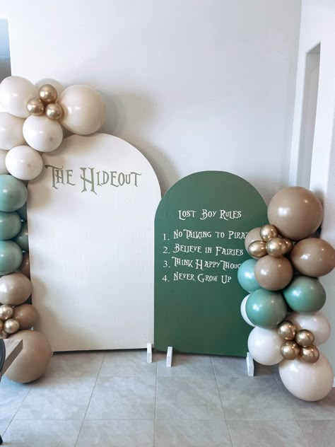 Never Grow Up First Birthday, Peter Pan Theme, Neverland Birthday, Lost Boys Birthday Party, Never Grow Up Birthday Party, Peter Pan Balloon Arch, Neverland Party Theme, Peter Pan 1st Birthday Boy, Peter Pan First Birthday Party