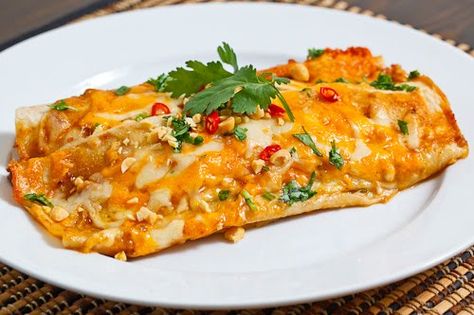 Thai Spicy Peanut Chicken Enchiladas Spicy Peanut Chicken, Closet Cooking, Thai Peanut Chicken, Fusion Recipes, Chicken Mole, Spicy Peanut Sauce, Peanut Chicken, Chicken Enchilada Recipe, Spicy Peanuts