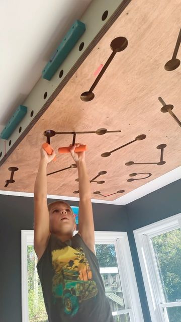 Melissa Augustyn on Instagram: "⚡️ Circuit Board ⚡️ 
&
🦇 Batarang Hopping 🪃

#ninjaobstacles #ninjawarrior #obstaclecourse #ocr #bodybuilding #calisthenics #bodyweightworkout #bodyweighttraining #basement #playroom #momlife" Obstacle Course Playroom, Indoor Ninja Course For Kids, Ninja Basement, Climbing Wall Playroom, Kids Obstacle Course Ideas, Active Kids Room, Kids Gym Room, Ninja Room, Obstacle Course Ideas