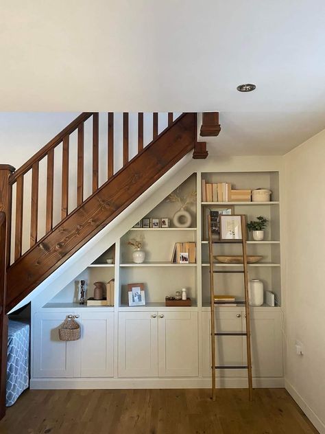 Door At Bottom Of Basement Stairs, Shelves Under Stairs, Under Stairs Nook, Foyer Storage, Stair Nook, Stairs In Living Room, House Staircase, Basement Living Rooms, Under Stairs Cupboard