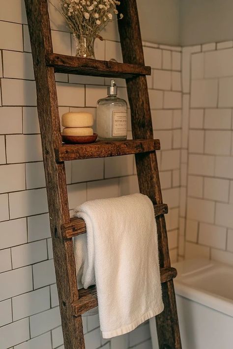 "Elevate your bathroom with the rustic elegance of a DIY Vintage Ladder Towel Rack! 🛠️🚿 Easy to make and perfect for a farmhouse or vintage-inspired look. 🌿✨ #DIYBathroomDecor #LadderUpcycle #TowelStorage" Towel Ladder Bathroom, Upcycle Ladder, Bathroom Tub Shower Combo, Vintage Ladder, Bathroom Tub Shower, Towel Ladder, Vintage Interior Design, Bathroom Tub, Towel Rack Bathroom