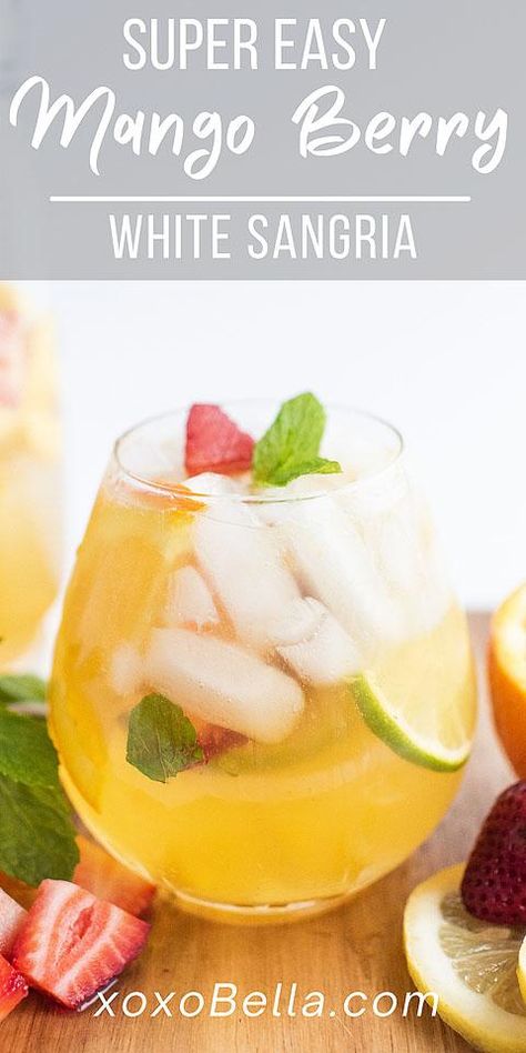 This mango citrus berry white sangria packs such a flavour punch. It’s a refreshing summer drink which everyone will love. Red sangria, made with red wine, might be the better known version, but this white sangria with summer fruit is the perfect choice for the summer. This is a super easy sangria recipe you can whip up anytime. If you are looking for a summer fruit cocktail recipe, you need to make this! #sangria #mango #lemon #orange #lime #strawberry #cocktail #whitewine #pitcher #... Mango Sangria Recipes White, Easy White Sangria Recipe, Cherry Cocktail Recipes, Summer Fruit Cocktails, Mango Sangria, Easy Sangria, Recipes With Fruit Cocktail, Summer Sangria Recipes, White Wine Sangria Recipe