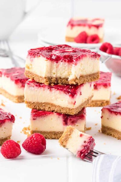 Raspberry Swirl Cheesecake Bars Cheesecake Bars Easy, Apple Cheesecake Bars, Raspberry Swirl Cheesecake, Raspberry Cheesecake Bars, Caramel Apple Cheesecake Bars, Cheesecake Squares, Raspberry Bars, Swirl Cheesecake, Chocolate Raspberry Cheesecake