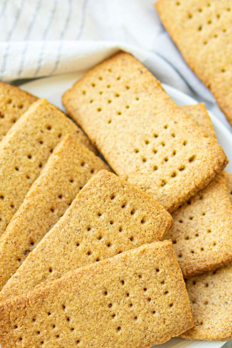 These easy almond flour graham crackers are perfect for making S'mores, or enjoying on their own! Low carb, gluten-free and dairy-free too. Graham Cracker Dough, Fluffy Bread Recipe, Graham Cracker Recipes, Gluten Free Graham Crackers, Food Meaning, Homemade Graham Crackers, Bake Bread, Homemade Pumpkin Puree, Gf Desserts