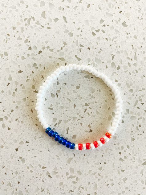 Bracelet Ideas Fourth Of July, Braves Clay Bead Bracelet, Memorial Day Bracelet Ideas, Clay Bead Bracelet Business Name Ideas, 4th Of July Earring Ideas, 4th Of July Seed Bead Bracelets, Usa Beaded Bracelet, Lightning Bolt Bracelet, Patriotic Beaded Bracelets