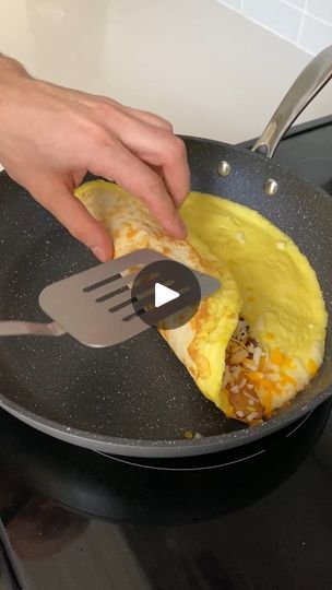 Genius Breakfast Hack | This breakfast hack is a gamechanger 😮 | By John Nonny | So what do we got going on
here? We got some eggs. Throw a wrap on top. Why though? Oh it
fuses it into one. Why I throw some bacon on there? Some
cheese. And that's a wrap. And that's a wrap. Dude we gotta
try this. Alright here we go. If this works this is a game
changer. Oh yeah. Right? For sure. And now we're going to
let this cook for about a minute or so and then place the
wrap on top. And then it should mold together. Fuse together.
Combined together. Become one. So if you have a look here it's
about done. Nice, nice. We're going to throw the wrap on top.
Set it until. And let it mold together. Alright, there it is.
It looks like it's sticking. Oh yeah, it's going to do its
thing. We got our bacon cook Breakfast Hack, Breakfast Wraps, Cooked Breakfast, Easy Cheesy, Cooking For One, Best Breakfast Recipes, Oh Yeah, Breakfast Brunch Recipes, How To Cook Eggs