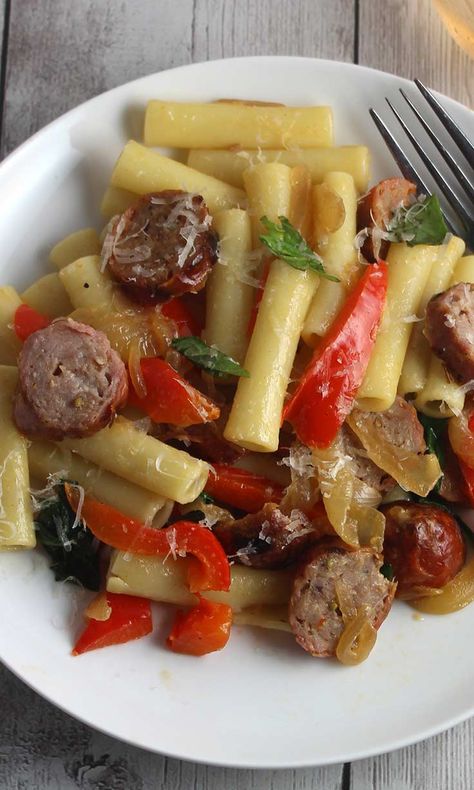 ziti tossed with sausage, peppers and onions for a quick and delicious pasta dinner. #pasta #sausages Ziti With Sausage, Sausage And Peppers Pasta, Pasta Sausage, Chicken Sausage Pasta, Easy Pasta Recipe, Sausage Peppers And Onions, Dinner Pasta, Sausage Peppers, Pasta Noodle Recipe