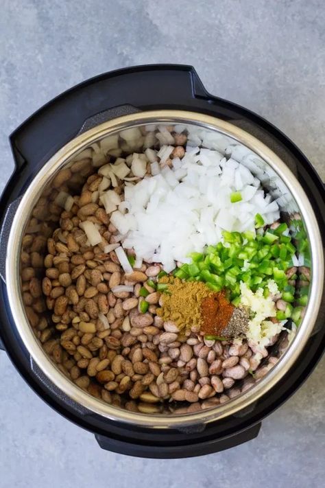 How to make the BEST Instant Pot Pinto Beans, with directions for both no soak beans and presoaked beans. Pressure cooking dry beans is so simple! This easy recipe includes both Mexican seasoned beans and plain unseasoned options. Vegan and vegetarian. Instant Pot Pinto Beans Recipe, Instant Pot Pinto Beans, Instant Pot Beans Recipe, Pressure Cooker Beans, Dry Beans Recipe, Pinto Bean Recipes, Refried Beans Recipe, How To Soak Beans, Vegan Instant Pot Recipes