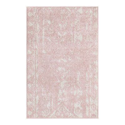 This boho-inspired area rug showcases a scrolling motif and a modern vibe that's just right for your living space. A striped design features geometric accents and botanical elements in pastel pink and white, with just the right amount of fading for a laid-back look. Power-loomed from polypropylene, it has a medium 0.5" high pile height, so it's best for lower traffic areas, such as your bedroom or home office. Best of all, this rug is stain-resistant and fade-resistant. We recommend pairing its Pink Dorm, Pink Bedroom For Girls, Southwestern Area Rugs, Pink Glam, Southwestern Rug, Solid Color Rug, Berry Ave, Linear Pattern, Future Apartment