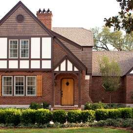 brick-tudor-stucco-front-gable-1cdabf82 Tudor Homes, Brick Homes, English Architecture, Mediterranean Architecture, Stucco Homes, Iron Balcony, French Style Homes, Colonial Style Homes, Mediterranean Style Homes