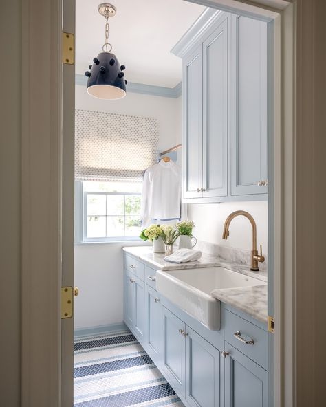 Transitional Laundry Room, Custom Dog Houses, Blue Laundry Rooms, Laundry Nook, Penny Tile, Patterned Floor Tiles, Blue Cabinets, White Cabinetry, Red Walls