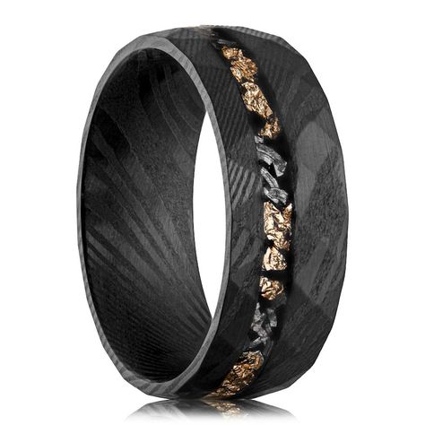 PRICES MAY VARY. Unique Design: The Damascus Meteorite & Crushed Gold Leaf Men's Wedding Band features a distinctive hammered black steel ring with a crushed gold leaf inlay, making it a remarkable and unique piece of jewelry. Exceptional Craftsmanship: Meticulously crafted from the finest materials, this ring is designed for durability and longevity, showcasing a rugged and masculine aesthetic. Versatile Occasions: Ideal for engagements, weddings, anniversaries, and promises, this ring is a pow Mens Wedding Rings Nature, Mens Band Ring, Vintage Engagement Rings Men, Unique Mens Wedding Bands Black, Men’s Black Engagement Ring, Fantasy Wedding Band, Black And Gold Mens Wedding Band, Black Rings Men, Guys Wedding Rings