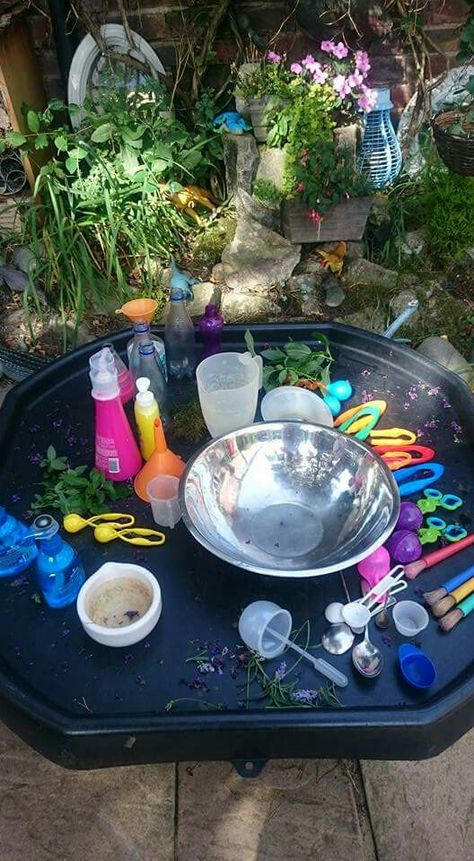 Potion making Potion Provocation, Potion Making Tuff Tray, Preschool Potion Making, Potion Making Eyfs, Eyfs Potions, Potion Station For Kids, Potion Making For Kids, Potion Station, Garden Pathway Ideas