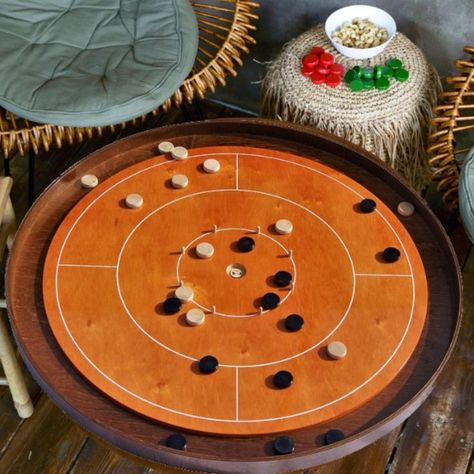 Masters Traditional Games Crokinole board in play. Crokinole Board, Scoring Board, Dinner Games, Entertaining Friends, Traditional Games, Making Things, Christmas Games, Gaming Gifts, The Game