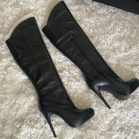 Knee high heel boots