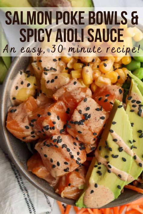 This salmon poke bowls recipe is quick, easy & incredibly tasty. Poke sauce recipe included in post! Packed with protein, veggies & flavor, poke bowls make an exciting, healthy lunch or dinner you'll really look forward to! Rice & mixed greens topped with sushi-grade teriyaki salmon, shredded carrots, edamame, corn, mango, avocado & black sesame seeds all drizzled with spicy aioli poke sauce dressing, yum! #pokebowlrecipe #pokesaucerecipe #salmonpokebowl #30minutemeals #easyseafood Salmon Poke Bowl Sauce, Poke Sauce Recipes, Poke Bowls Recipe, Poke Bowl Sauce, Poke Sauce, Salmon Poke Bowl Recipe, Poke Recipe, Protein Veggies, Poke Bowl Recipe