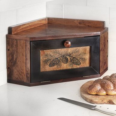 A Black Forest Decor Exclusive - This solid knotty pine corner breadbox offers ample storage to declutter your counters and a low profile for additional space above. Due to the nature of the wood, natural variations and imperfections will occur; each one is unique. Made in the USA. 24"W x 17"D x 12"H. Vintage Wood Decor, Witchy Cottage Decor, Witchy Kitchen Decor Ideas, Cabincore Decor, Kitchen Corner Counter Decor, Breadbox Ideas, Diy Forest Decor, Hobbit House Decor, Cottagecore Furniture