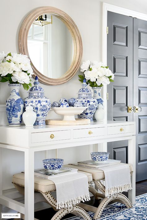 SPRING ENTRYWAY DECOR: A BRIGHT & CHIC SPACE! Blue And White Buffet Decor, Painted Foyer Table, Hampton Style Entryway, Blue And White Floral Bedroom, Blue And White Decorating Ideas, Spring Entryway Decor, Spring Entryway, Blue And White Decor, Blue And White Living Room