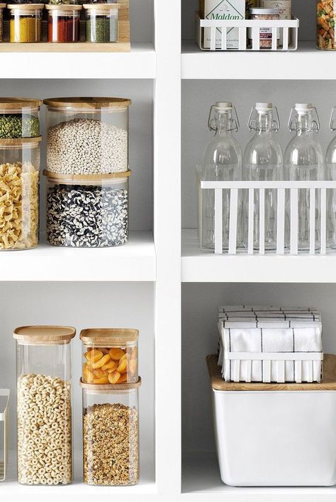 These pantry storage containers, including glass canisters and woven baskets, are perfect for organizing the space where you keep dried goods and snacks. Beautiful Pantry, Pantry Containers, Pantry Storage Containers, Cereal Containers, Fridge Organization, Airtight Food Storage, Airtight Food Storage Containers, Glass Canisters, Pantry Design