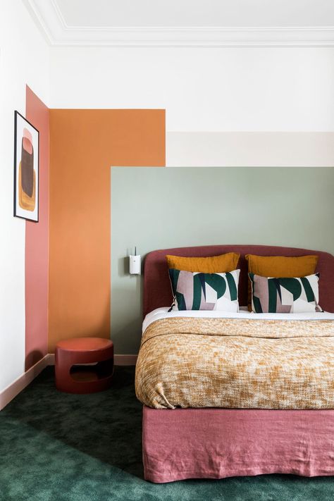 13 Art Ideas for Above the Bed that Aren't Frames of Canvas Colourblock Walls Bedroom, Mid Century Wall Painting, Mint And Orange Bedroom, Color Walls Ideas, Pink And Rust Bedroom, Colored Walls Bedroom, Mint Walls Bedroom, Three Color Wall, Paint Walls Ideas