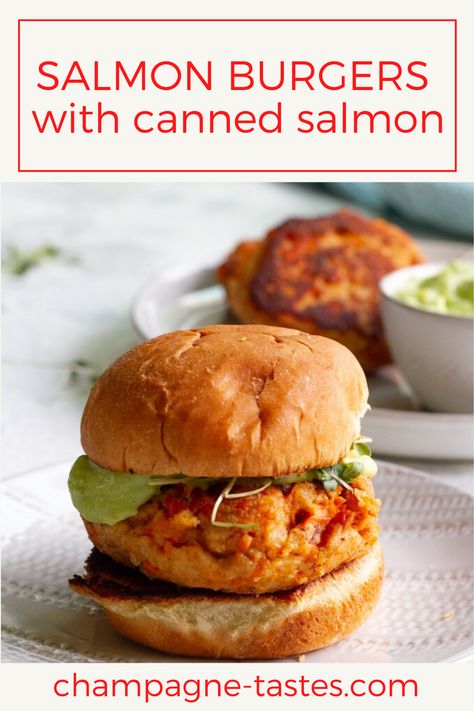 These easy salmon burgers are made with canned salmon, yogurt, breadcrumbs, and a few easy-to-find seasonings.  Serve them with a quick and easy avocado sauce! Salmon Burger Toppings, Easy Salmon Burgers, Pink Salmon Recipes, Easy Fish Cakes, Burgers With Avocado, Salmon Burger Recipe, Canned Salmon Recipes, Salmon Burger, Delicious Salad Dressings