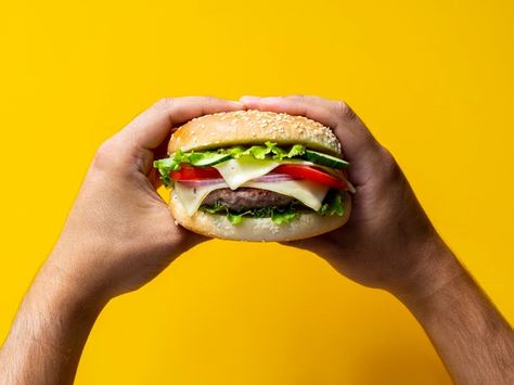 Close-up of burger with french fries | Free Photo Burger Bites, Perspective Photography, Hand Model, French Fries, Premium Photo, Food Photo, Hot Dog Buns, Free Photo, Cheeseburger