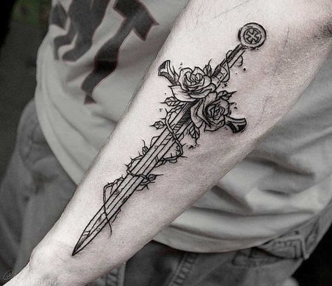 Sword and roses tattoo on the left forearm by Andrew Rose Vine Tattoos, Wörter Tattoos, Rose Tattoo Meaning, Knife Tattoo, Cool Forearm Tattoos, Tattoo Convention, Angel Tattoo Designs, Vine Tattoos, Dagger Tattoo