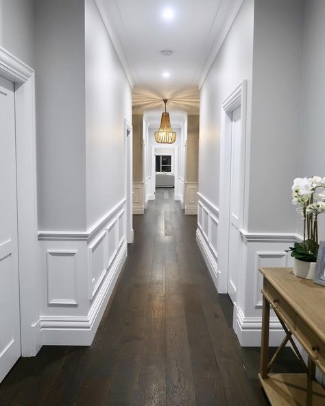 “What is Wainscoting called in Australia?” Confusion sets in as there are many types and names for ‘wainscoting’ that are used interchangeably or between different applications onto the wall, so here’s the difference. Click Here To Learn More. Hamptons House Interior, Wainscoting Ideas, Hamptons Style Homes, Hamptons Style Home, Wainscoting Panels, Hallway Designs, Long Hallway, Decorative Wall Panels, 아파트 인테리어